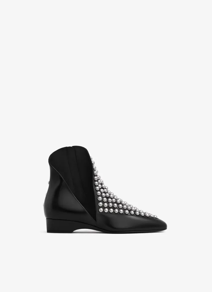 Alaa Boots and Ankle Boots ASYMETRIC ANKLE BOOTS IN GLOSSY CALFSKIN WITH STUDS Black 8211 Women