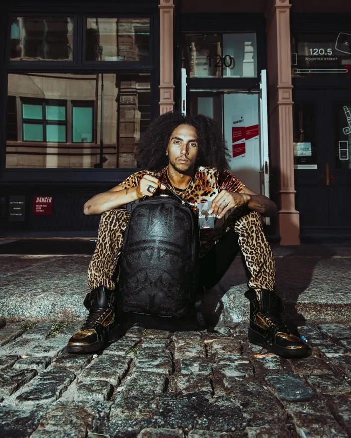 SPRAYGROUND Backpacks AFRICAN INTELLIGENCE 9 APEX GENIUS BACKPACK 8211 SANDFLOWER COLLAB 8211 Universal SPRAYGROUND Backpacks AFRICAN INTELLIGENCE 9 APEX GENIUS BACKPACK 8211 SANDFLOWER COLLAB 8211 Universal
